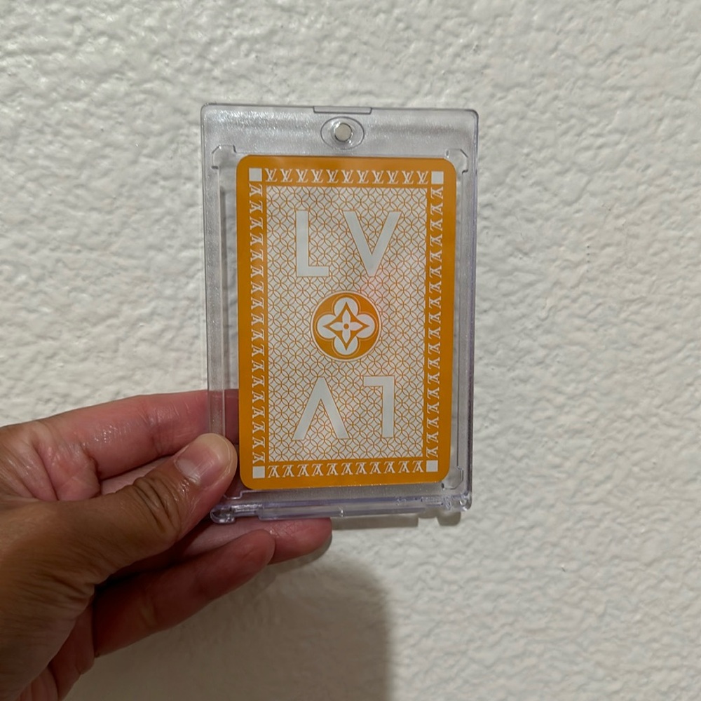 Enclosed LV playing card